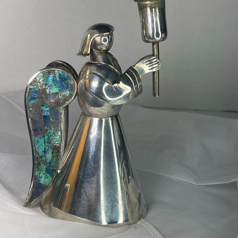 Los Castillo Taxco angel candle holder designed by Salvador Teran.